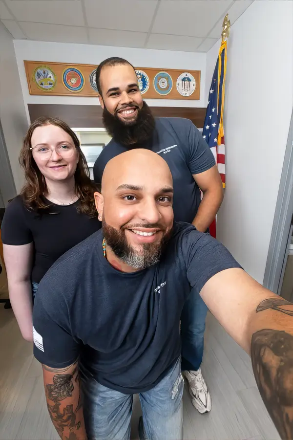 Jose Morales taking a selfie with friends