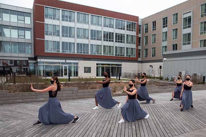 Dancers on boardwalk