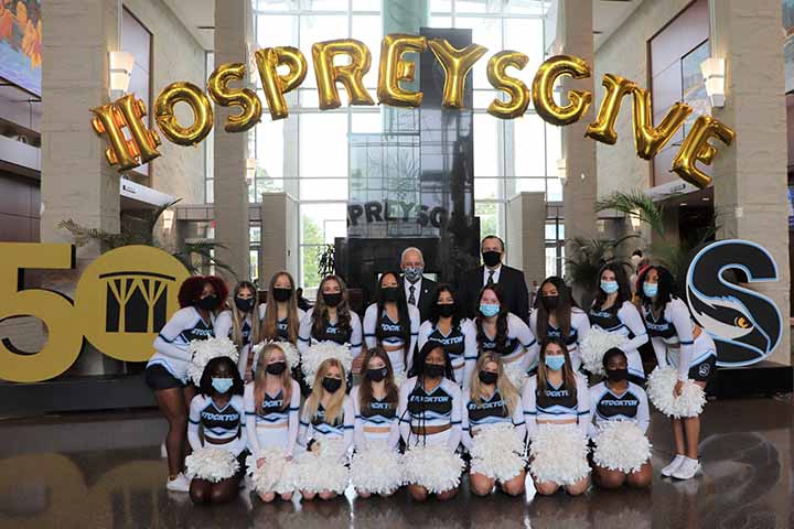 President Kesselman and Dan Nugent with Stockton dance team