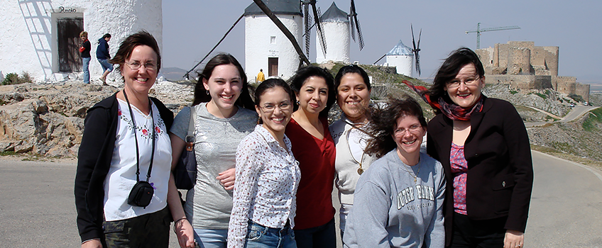 students in front of windmills