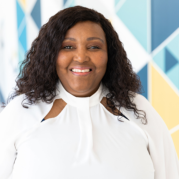 Sephoko Stokes, standing in the Unified Sciences Center