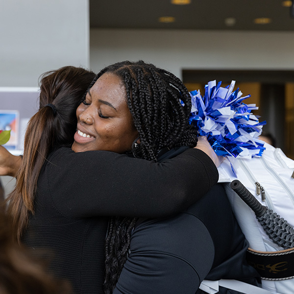 Shahyan Abraham, hugging someone before leaving for a NCAA competition in Alabama