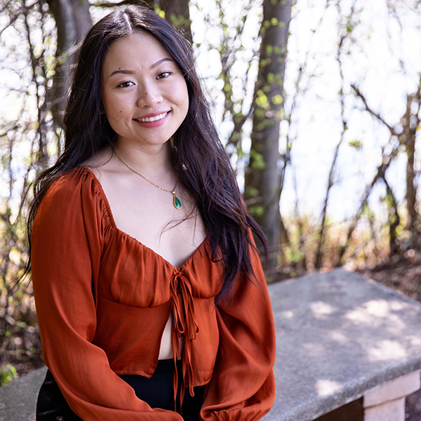 Yvonne Tran, in front of Lake Fred