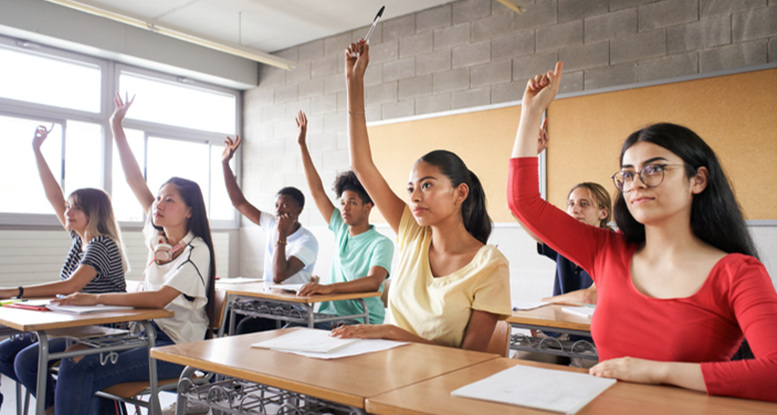 Students raising hands