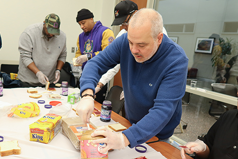 President Joe making PB&J sandwiches with MSA during MLK Day of Service