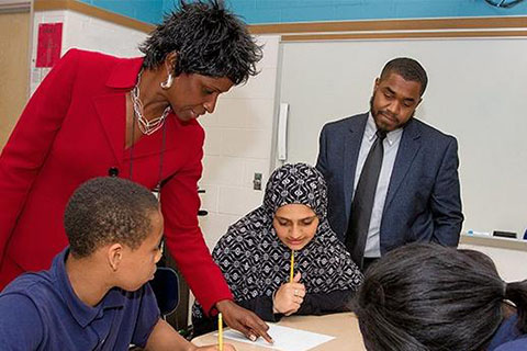 Teachers and students at a homework completion program