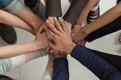 Stock image of hands in the center