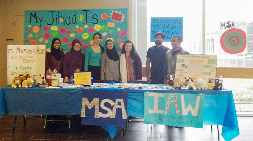 Members of the Msulim Student Association tabling for Islam Awareness Week in 2014. Sadaf is on the furthest left!