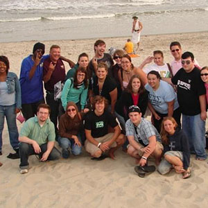Orientation Leader team group shot on the beach