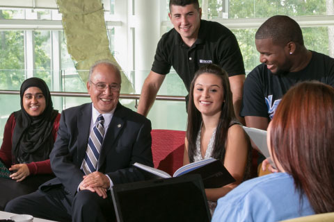 Harvey Kesselman with students