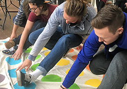 Students playing a game of cooperation