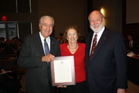 William J. Hughes presenting an award