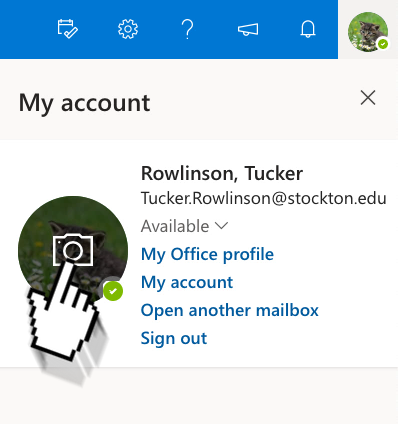 A screenshot of Outlook Web in the "my account" menu, an arrow is pointing towards the button to change a profile picture.