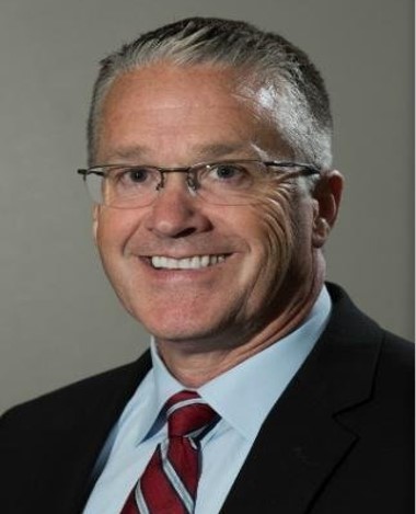 Mr. Lauren H. Moore