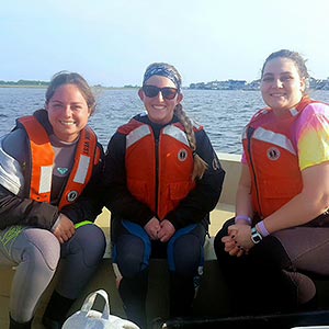 Image of Stockton University students Faelyn Meyers, Allie Hoffman, Dani Dyson