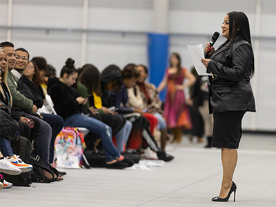 Heather Medina talking to students 