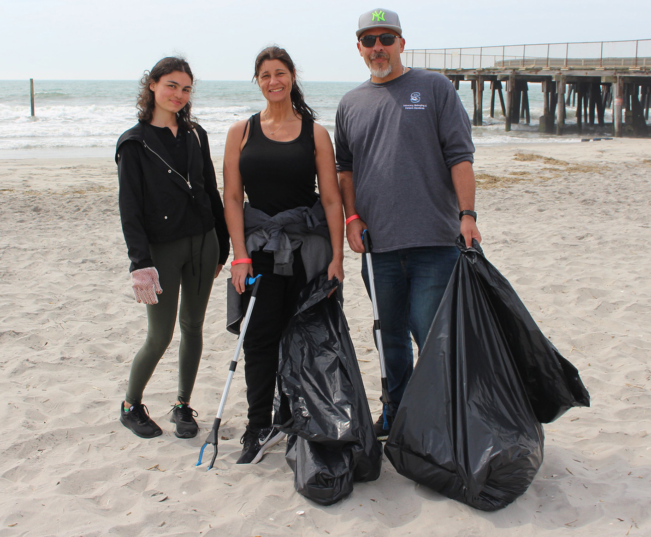 Community day volunteers on the beach