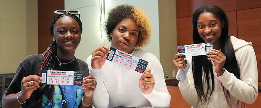 Students received 'boarding passes' to be stamped by various tables at this year's Glow Up on Thursday, Sept. 21.