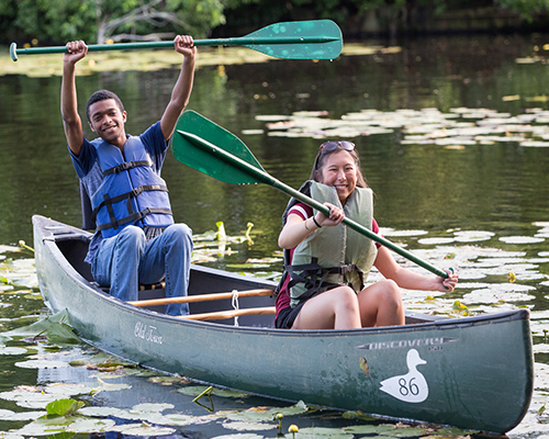 Students canoeing on Lake Fred