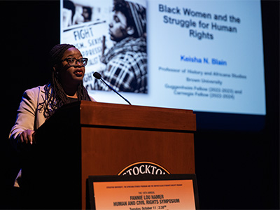 Kiesha N. Blain Kiesha N. Blain speaking at the symposium.