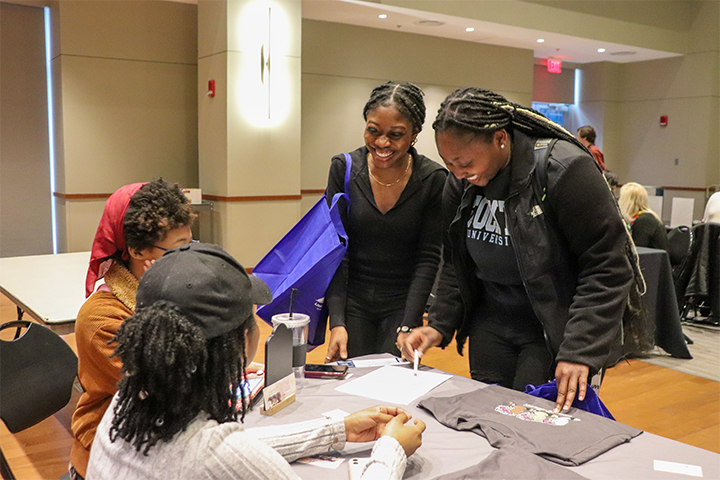 TogetHER members during the Glow Up Opportunity Fair 2023