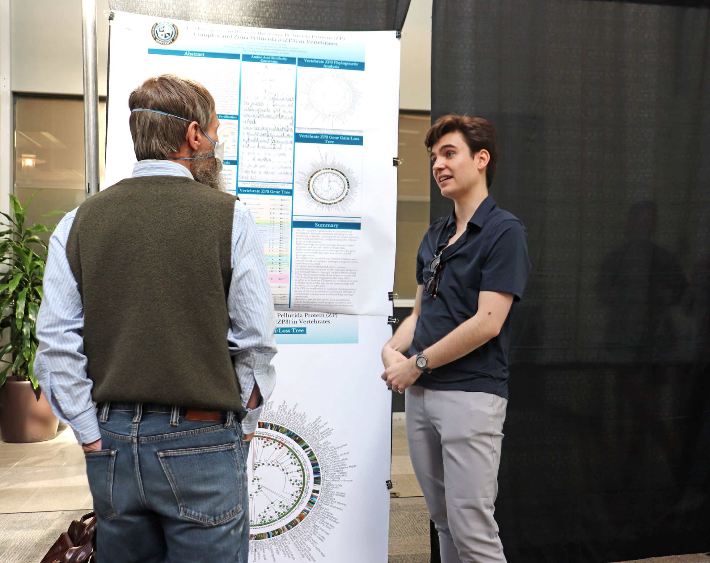 Matthew Metzler was an honorable mention in the NAMS Symposium on April 22. He stands in front of his project and chats with a faculty member. Matthew Metzler was an honorable mention in the NAMS Symposium on April 22. He stands in front of his project and chats with a faculty member.