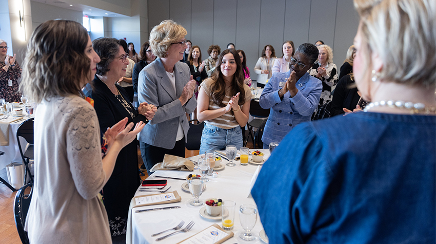 Johanna Johnson amid a standing ovation