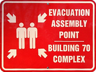 closeup image of Building 70 evacuation assembly sign