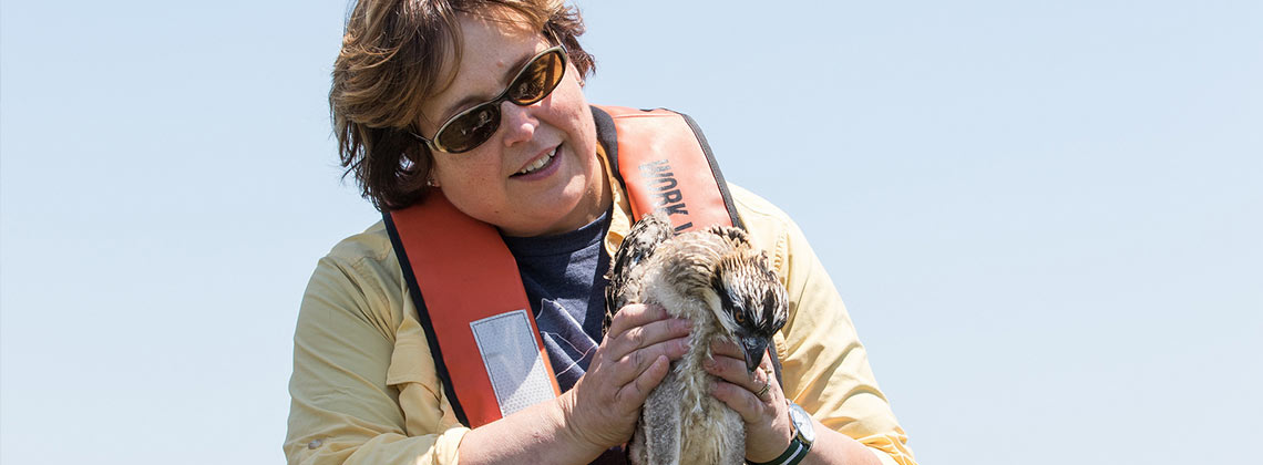 Susan holding an osprey