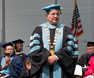 Harvey Kesselman wearing the Presidential Medallion at Commencement