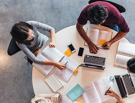 People studying at a table