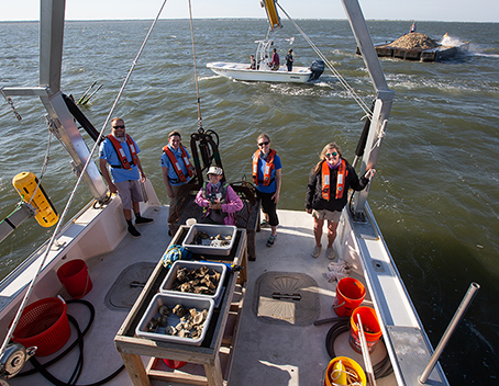 Image of Drs. Thompson and Pfeiffer-Herbert, Steve Evert and Oyster Restoration Partner onboard the R/V Petrel