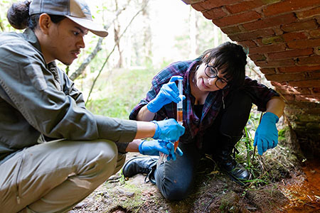 Lauren Seyler and student in the Pinelands