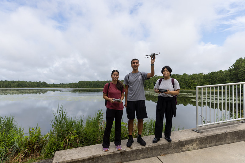 Math students using drone to take measurements of Lake Fred