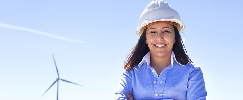 Image of woman in wind turbine farm