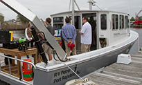 Image of Sustainability Program Students working on sustainable motor