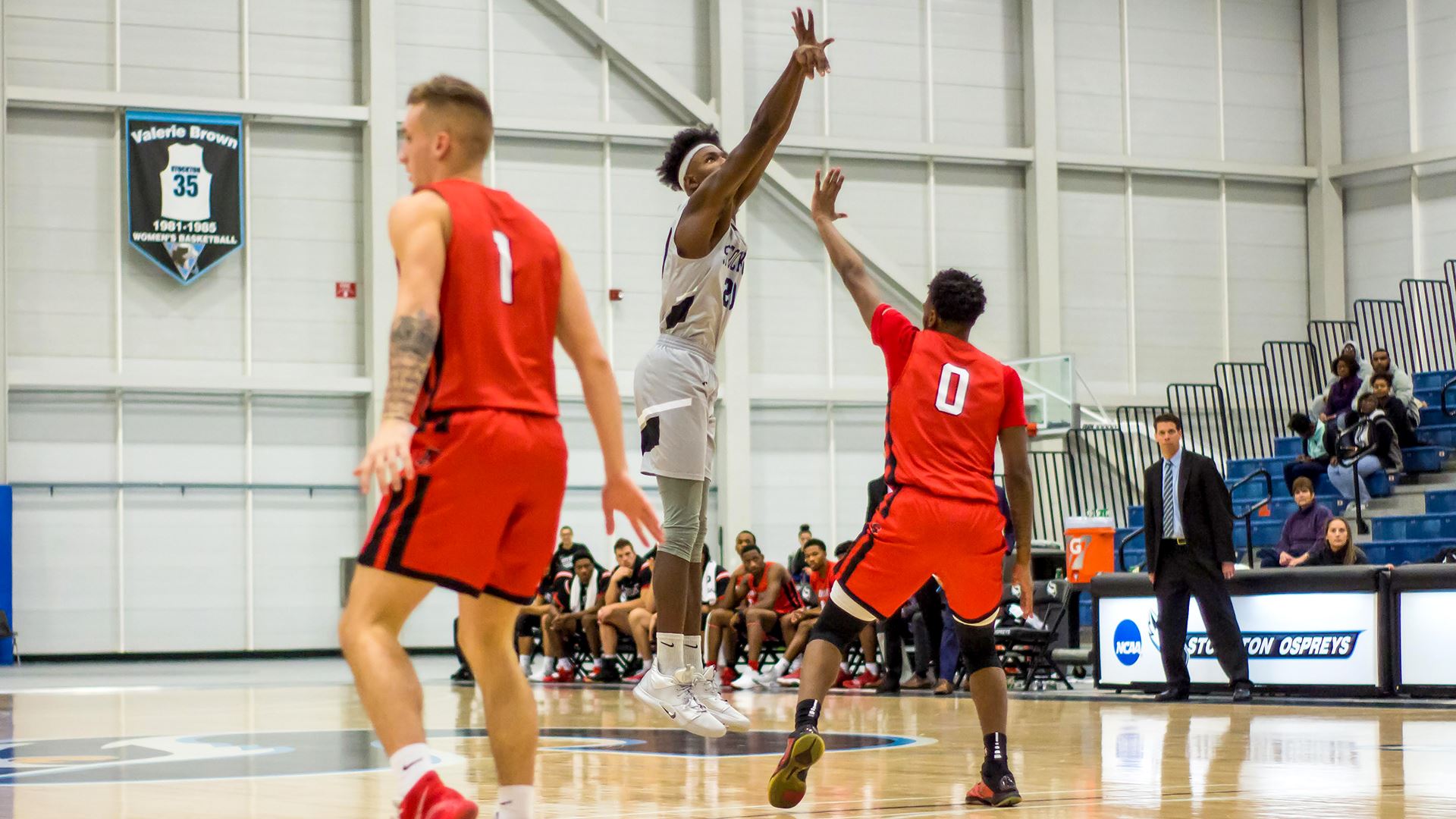 men playing basketball 