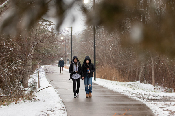 students walking on path