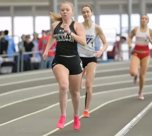students running on track