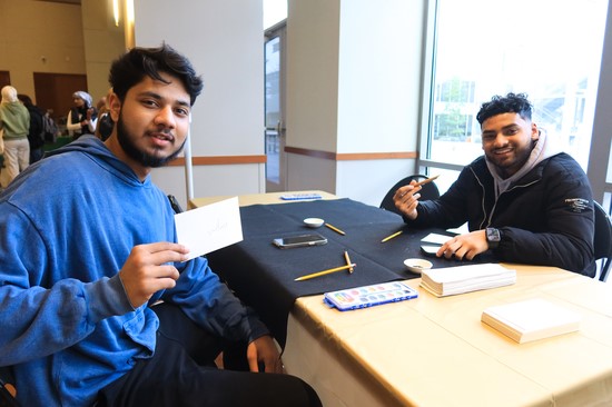 two students at table