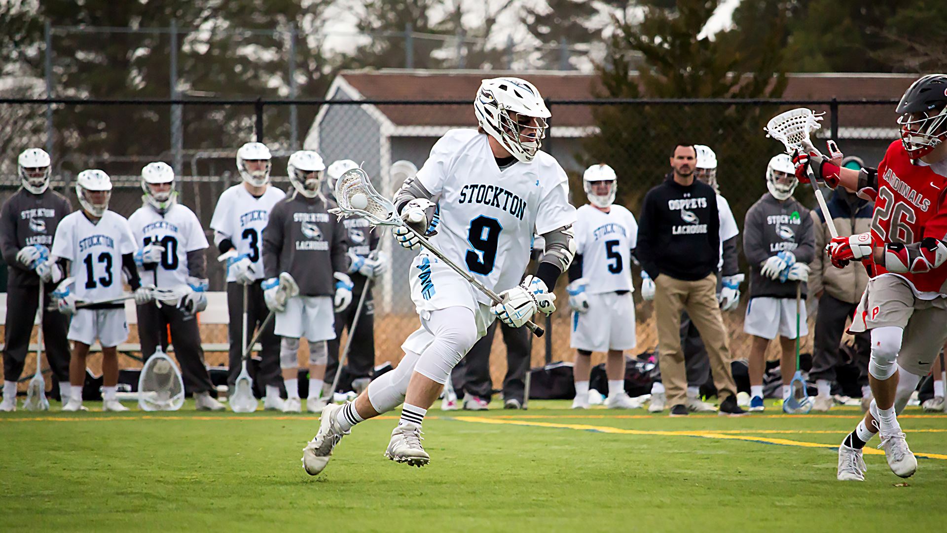 men's lacrosse team playing 