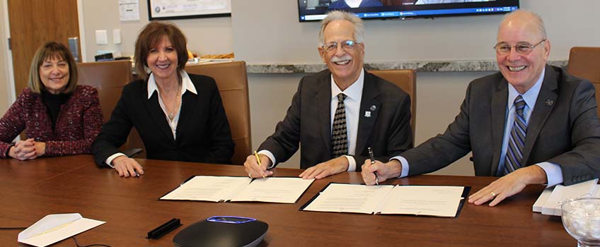  Barbara Perskie, Stockton Foundation Chair Donna Buzby, Steven P. Perskie and Stockton President Harvey Kesselman 