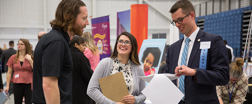 students talking to advisers 