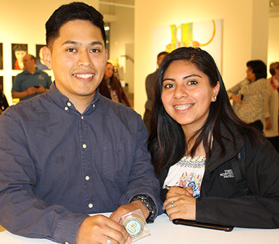 man and woman smiling 