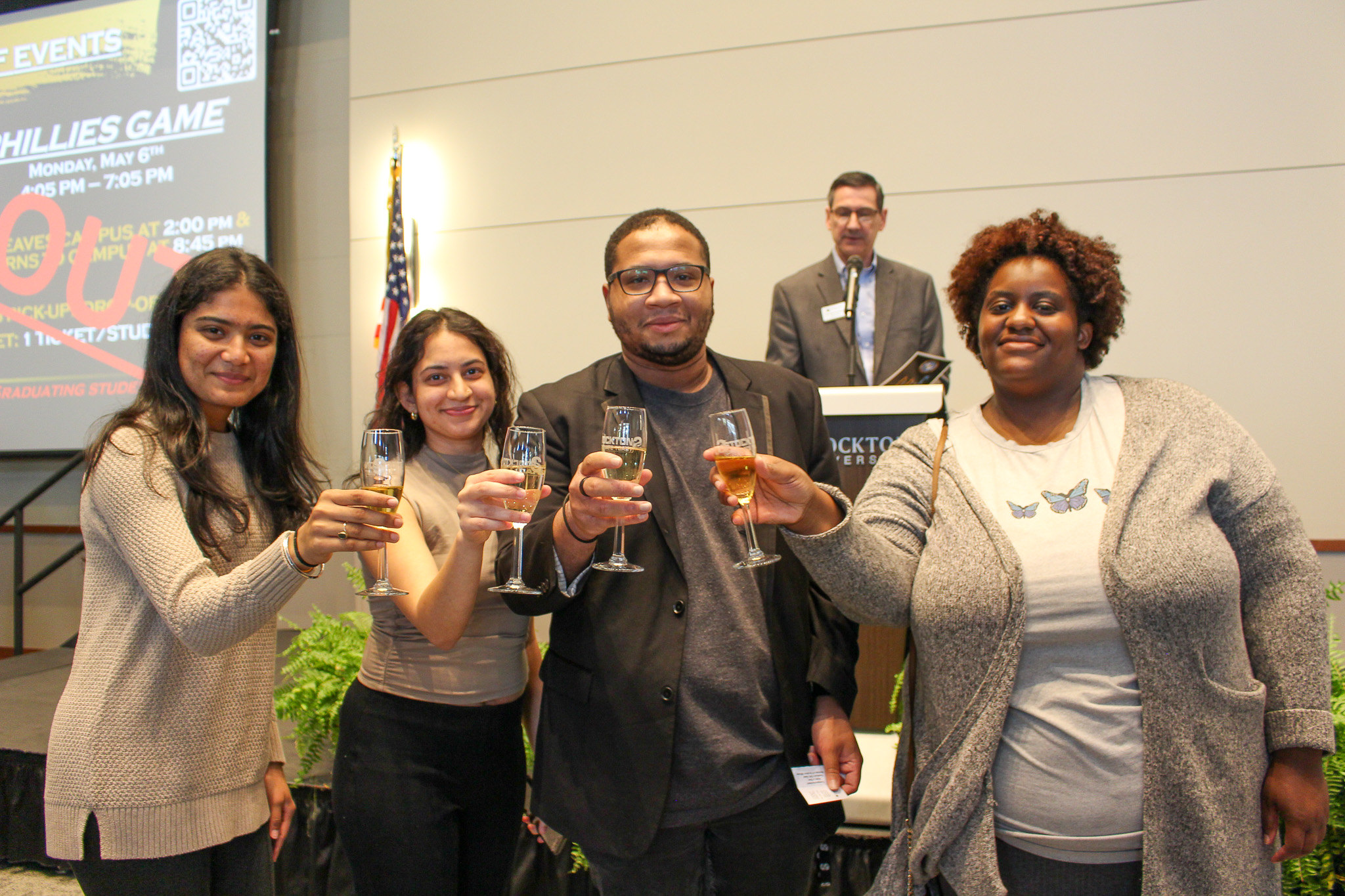 students at grad toast