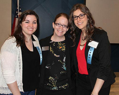 three women smiling