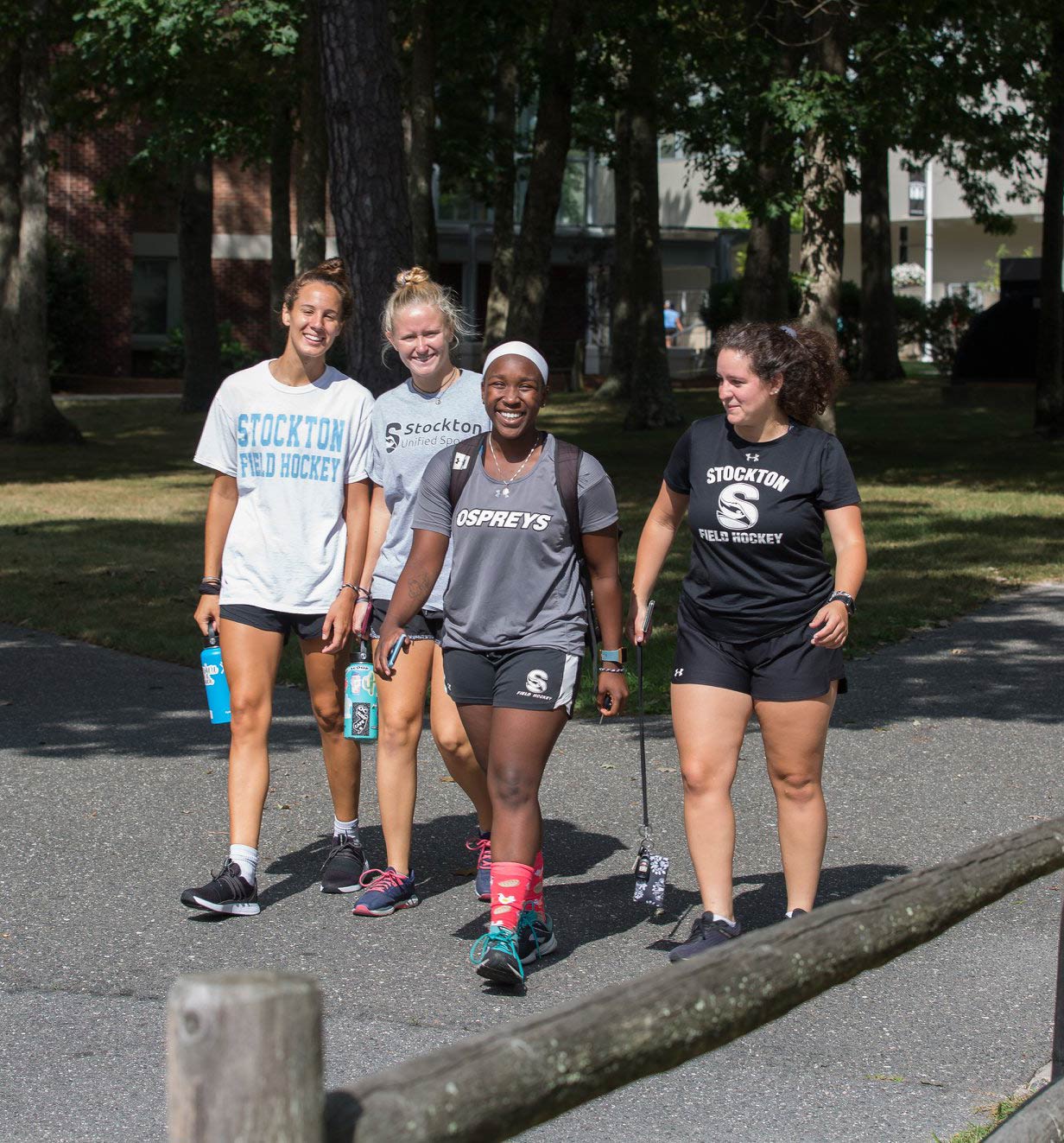 three girls walking outside 