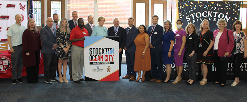 Representatives of the Ocean City School District and Stockton University at the Dual Path Partnership agreement signing at Ocean City High School.