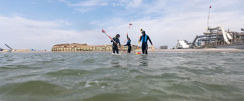 stockton students surveying beach