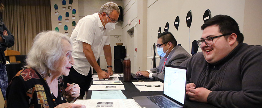 Holocaust Center staff member Irvin Moreno-Rodriguez (rear) and recent graduate George Quinn interview Holocaust survivor Sonia Kaplan and Izzy May,